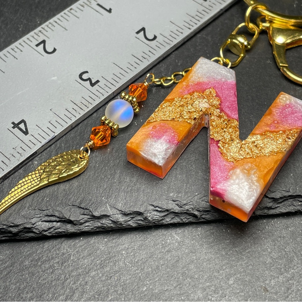 Orange, Gold and Pink Initial Letter “N” Boho Keychain With Angel Wing Charm - Picture 9 of 11